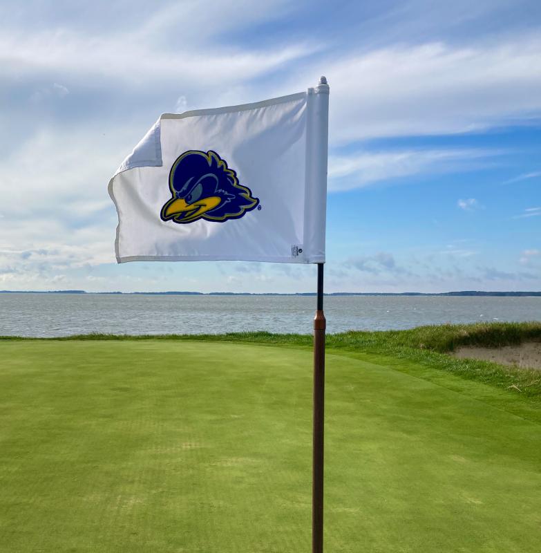 Heavy winds kept the hole flags flying during the 10th annual Lady Blue Hen Invitational tournament at Rehoboth Beach CC Oct. 21-22. FRITZ SCHRANCK PHOTO
